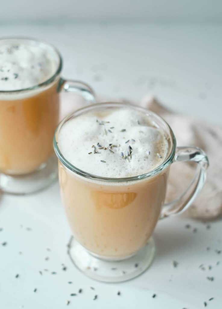 lavender tea lattes in glass mugs 