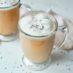 lavender tea latte in glass mug