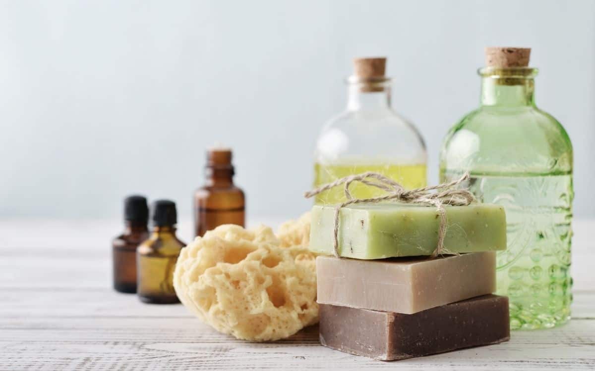 natural soaps, bottles, and sponge