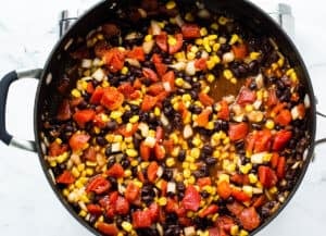black beans, corn, and tomatoes in pan