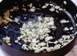 diced onions in pan
