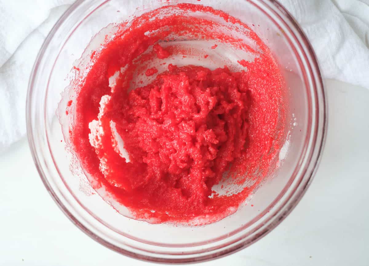 coconut oil, sugar, and food coloring mixed together