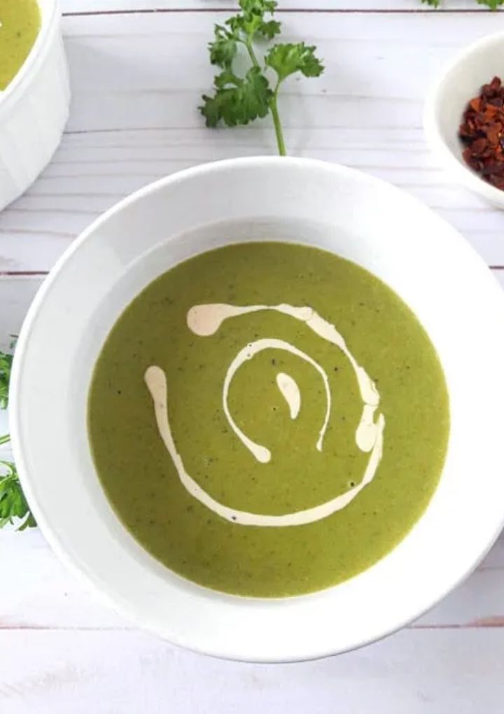 green pea and mint soup in white bowl