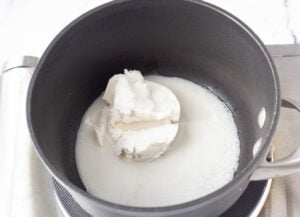 coconut cream melting in saucepan