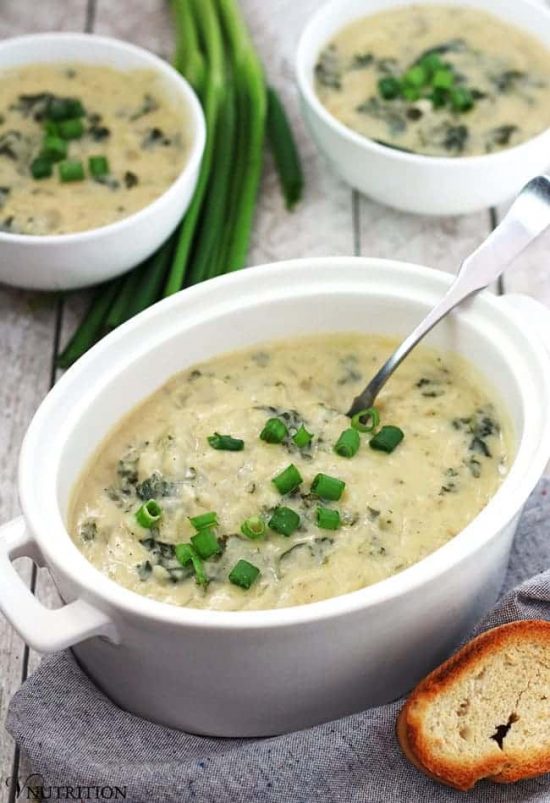vegan colcannon soup in white serving crock
