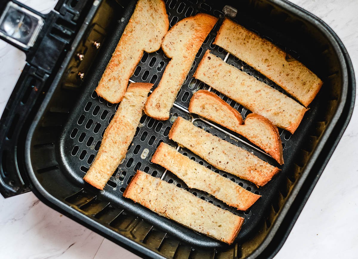 strips of bread baked until golden brown in an air fryer basket