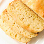 vegan lemon loaf slices on white plate