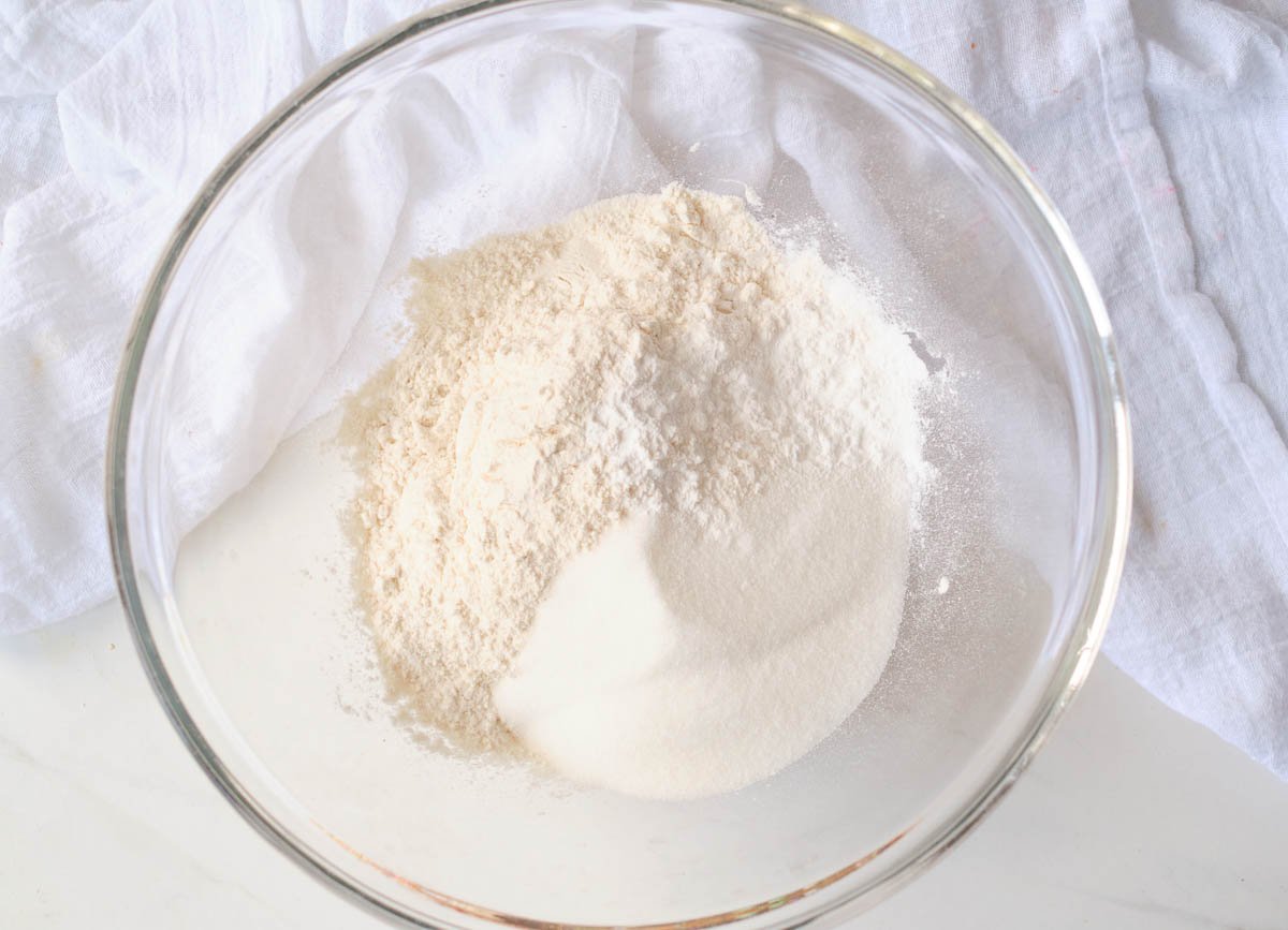 Flour, baking powder, and salt in mixing bowl.