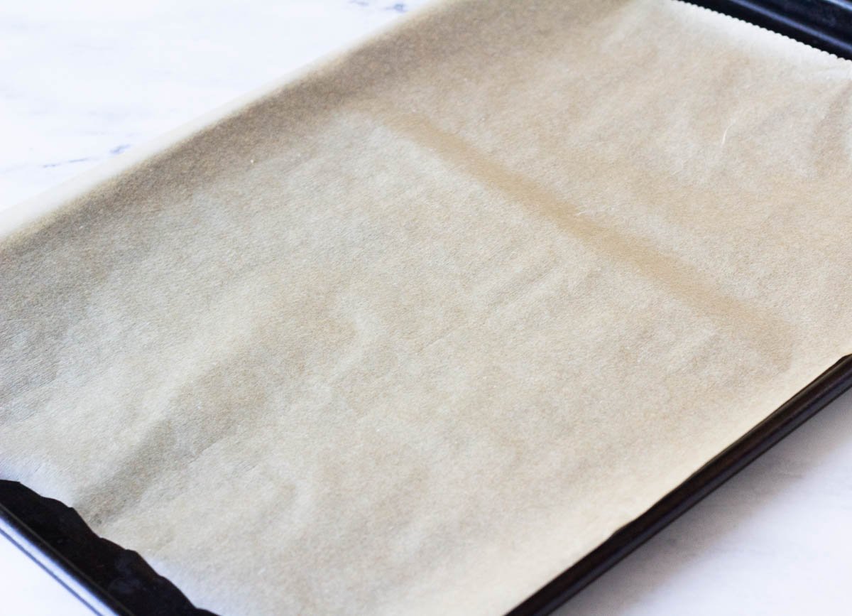 Baking sheet lined with parchment paper.