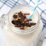 coconut milkshake topped with chocolate and almonds