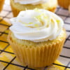 vegan lemon cupcake with lemon buttercream frosting, topped with lemon zest
