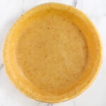 unbaked gluten free pie crust in pie dish
