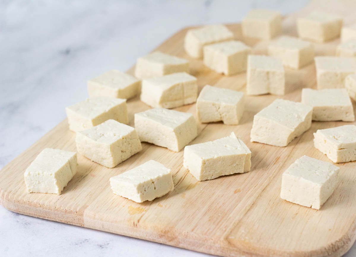 tofu cubes on cutting board
