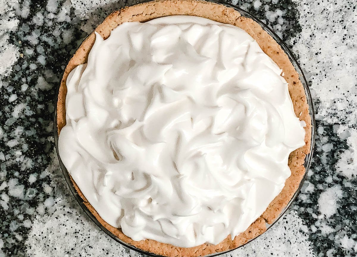 Meringue topping on pie with lots of edges and peaks.