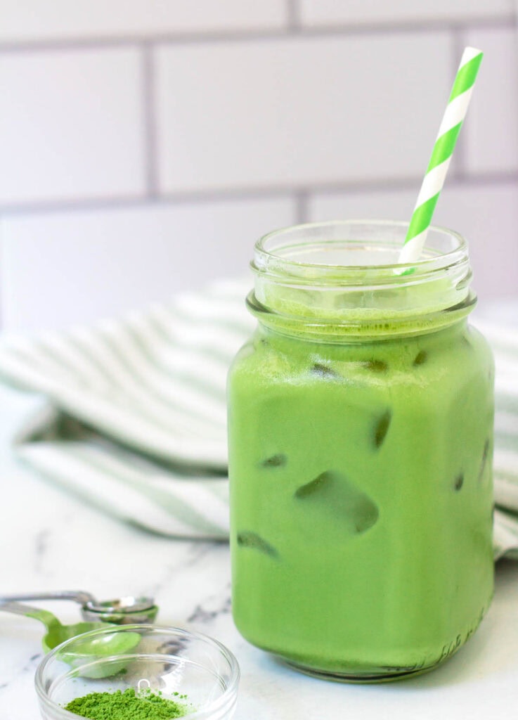 iced matcha latte in mason jar