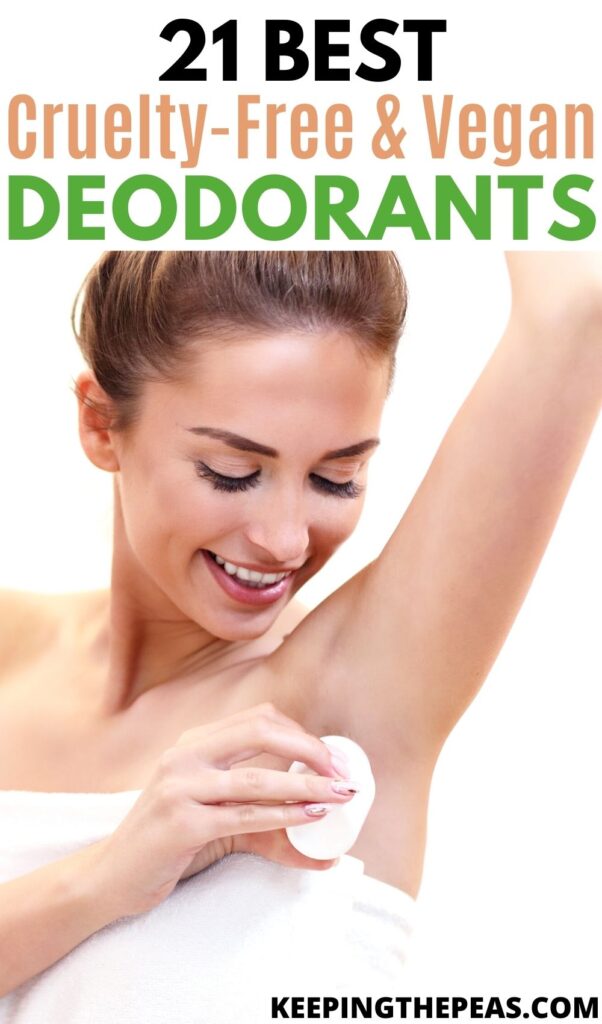 woman putting on deodorant in towel