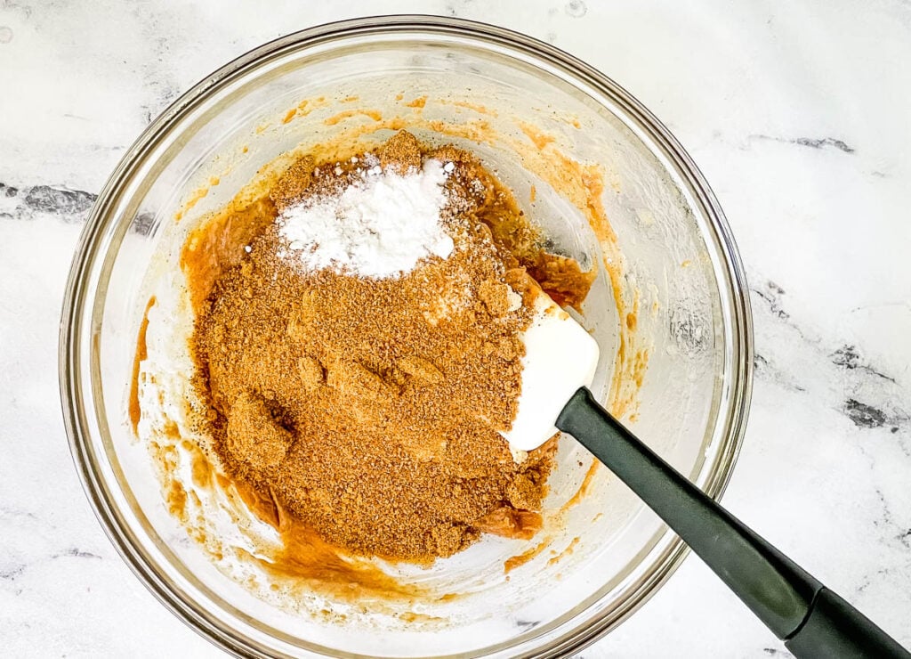 Coconut Sugar, and baking soda in bowl with peanut butter.