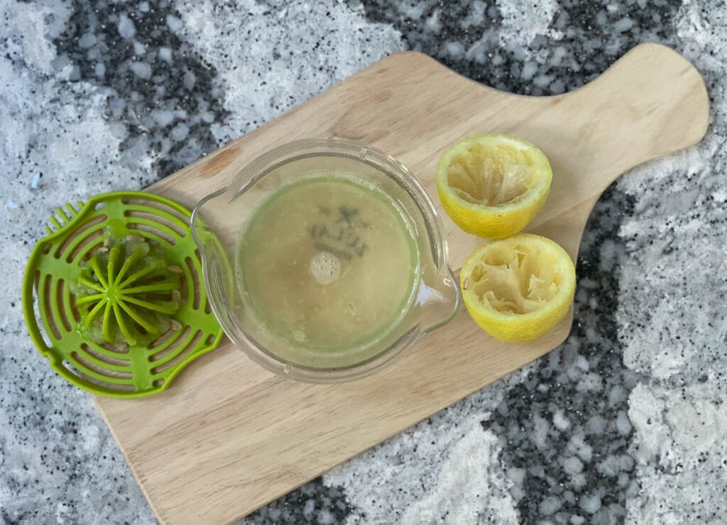 Lemon juice in citrus juicer.