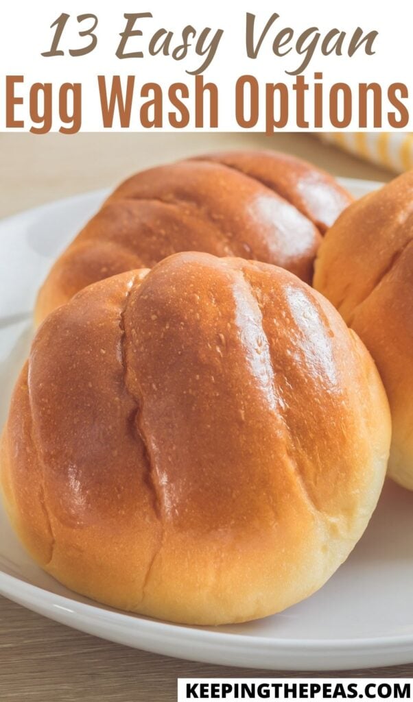 Browned rolls on plate brushed with a vegan egg wash.