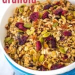 Cranberry pumpkin seed granola in bowl.