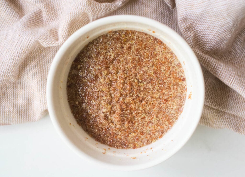 Flax egg in small white bowl.