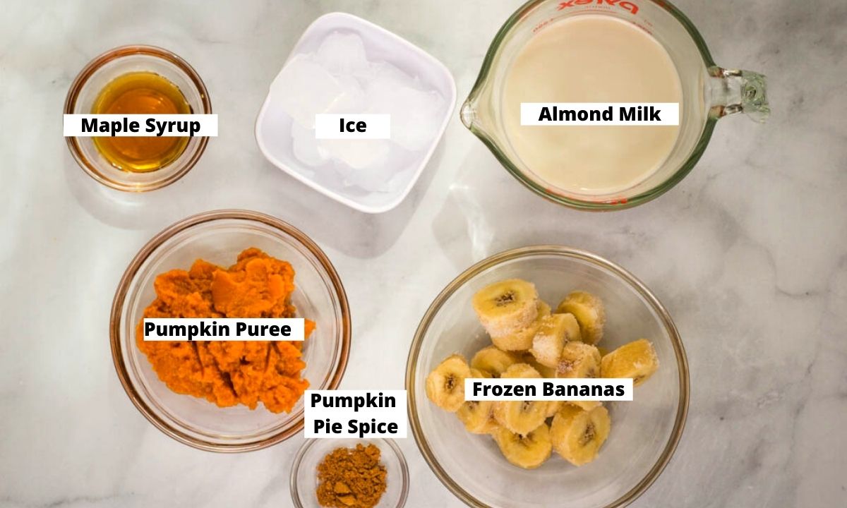 Maple syrup, ice, almond milk, frozen bananas, pumpkin pie spice, and pumpkin puree.
