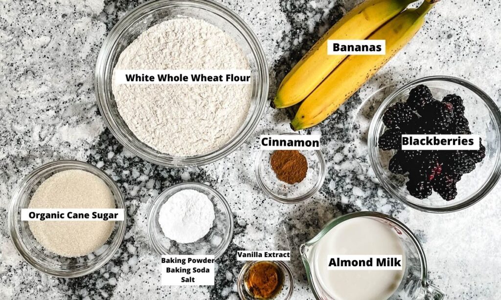 White whole wheat flour, bananas, blackberries, almond milk, vanilla extract, baking powder, cinnamon, cane sugar. 