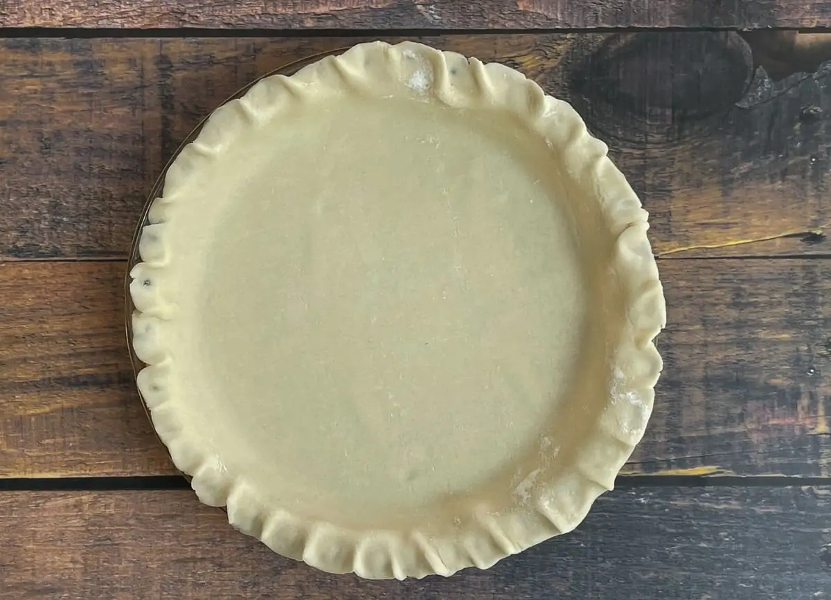 Unbaked pie crust in pie dish. 