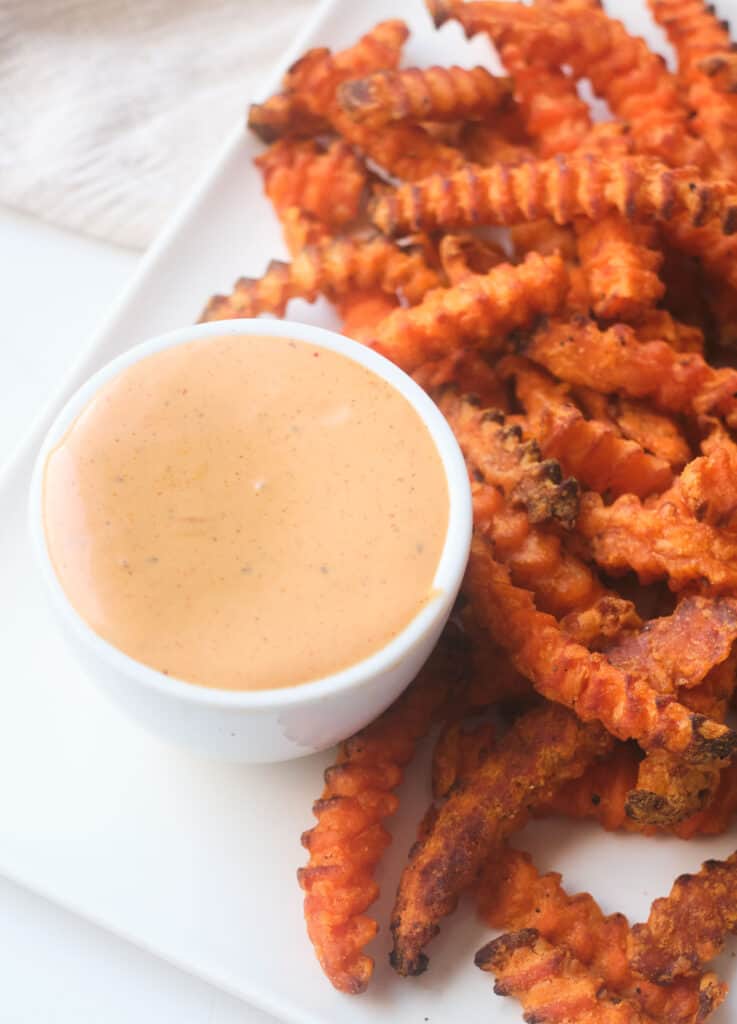 Chipotle dipping sauce with sweet potato fries. 