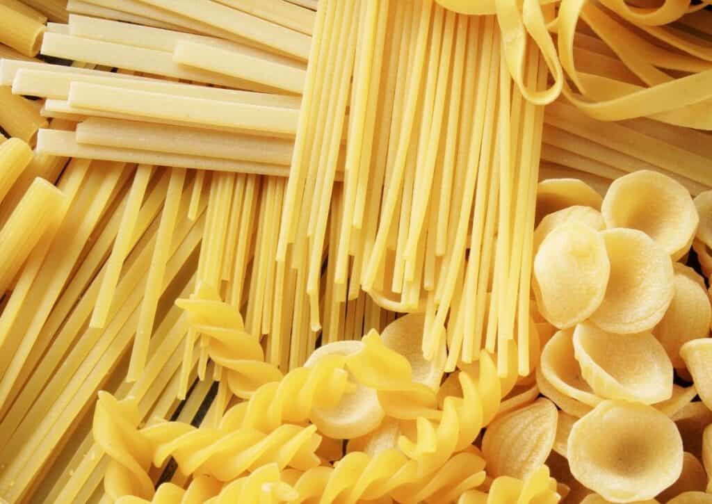 Dried pasta shells, spaghetti, and linguine. 