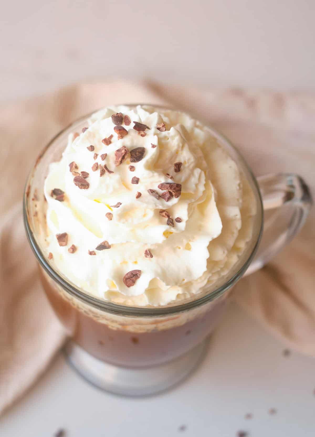 Mocha latte topped with whipped cream.
