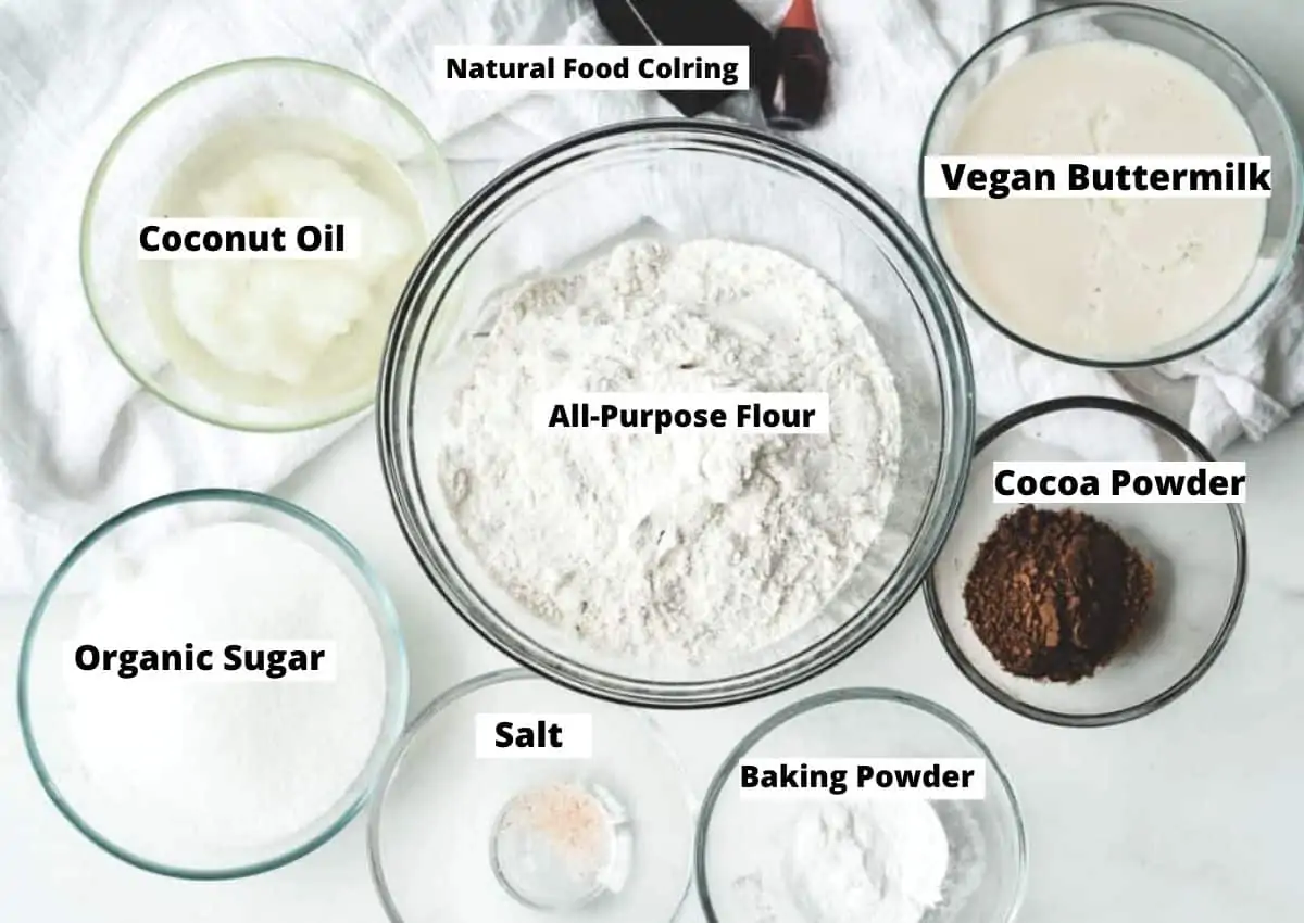 Vegan Red Velvet Cake Ingredients: vegan buttermilk, cocoa powder, baking powder, salt, organic sugar, coconut oil, all-purpose flour, natural red food coloring. 