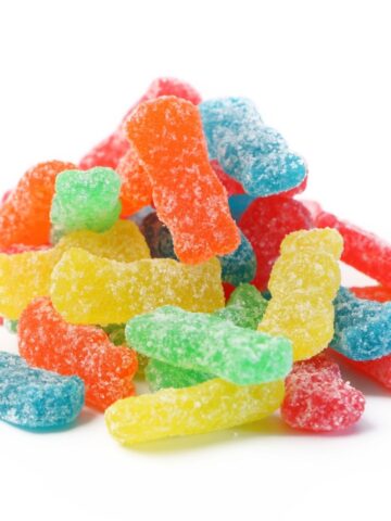 A colorful pile of sour patch kids.