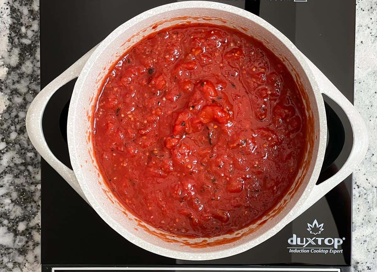 Tomato sauce in saucepan. 