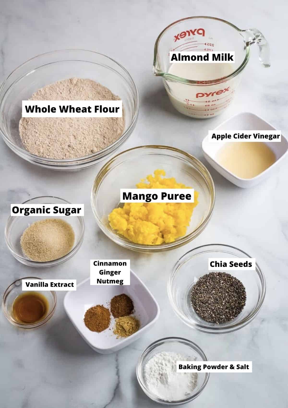 Mango Pancakes Ingredients: Whole wheat flour, almond milk, apple cider vinegar, mango puree, chia seeds, baking powder, salt, cinnamon, ginger, nutmeg, vanilla extract, organic sugar. 