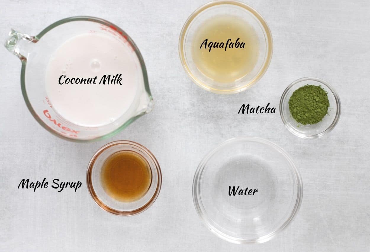 Dalgona Matcha Ingredients: Coconut milk, aquafaba, matcha powder, water, maple syrup. 
