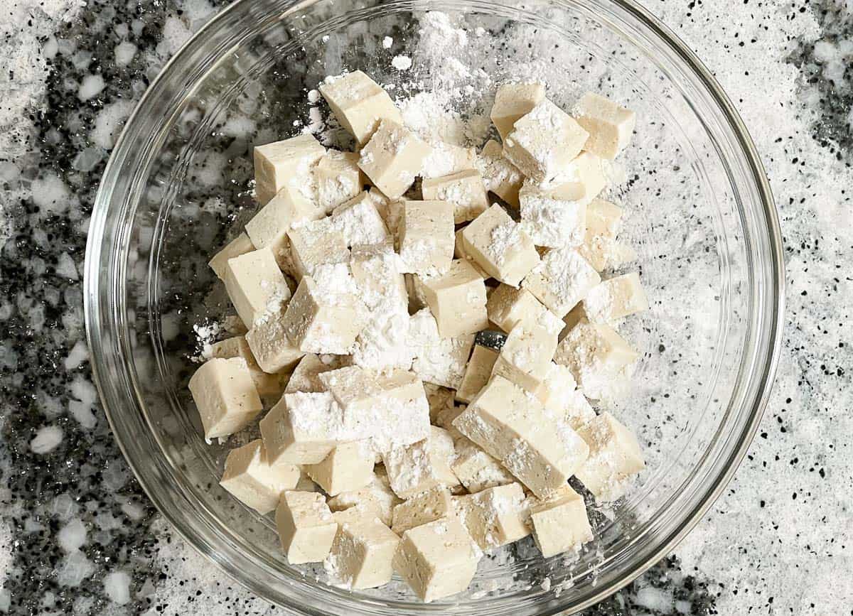 Cubed tofu tossed with corn starch.