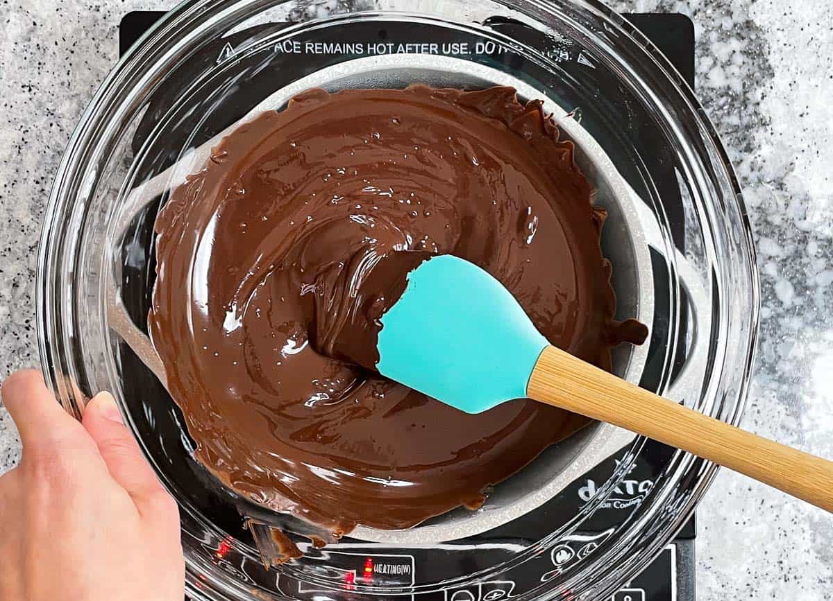 Chocolate melted over double boiler. 