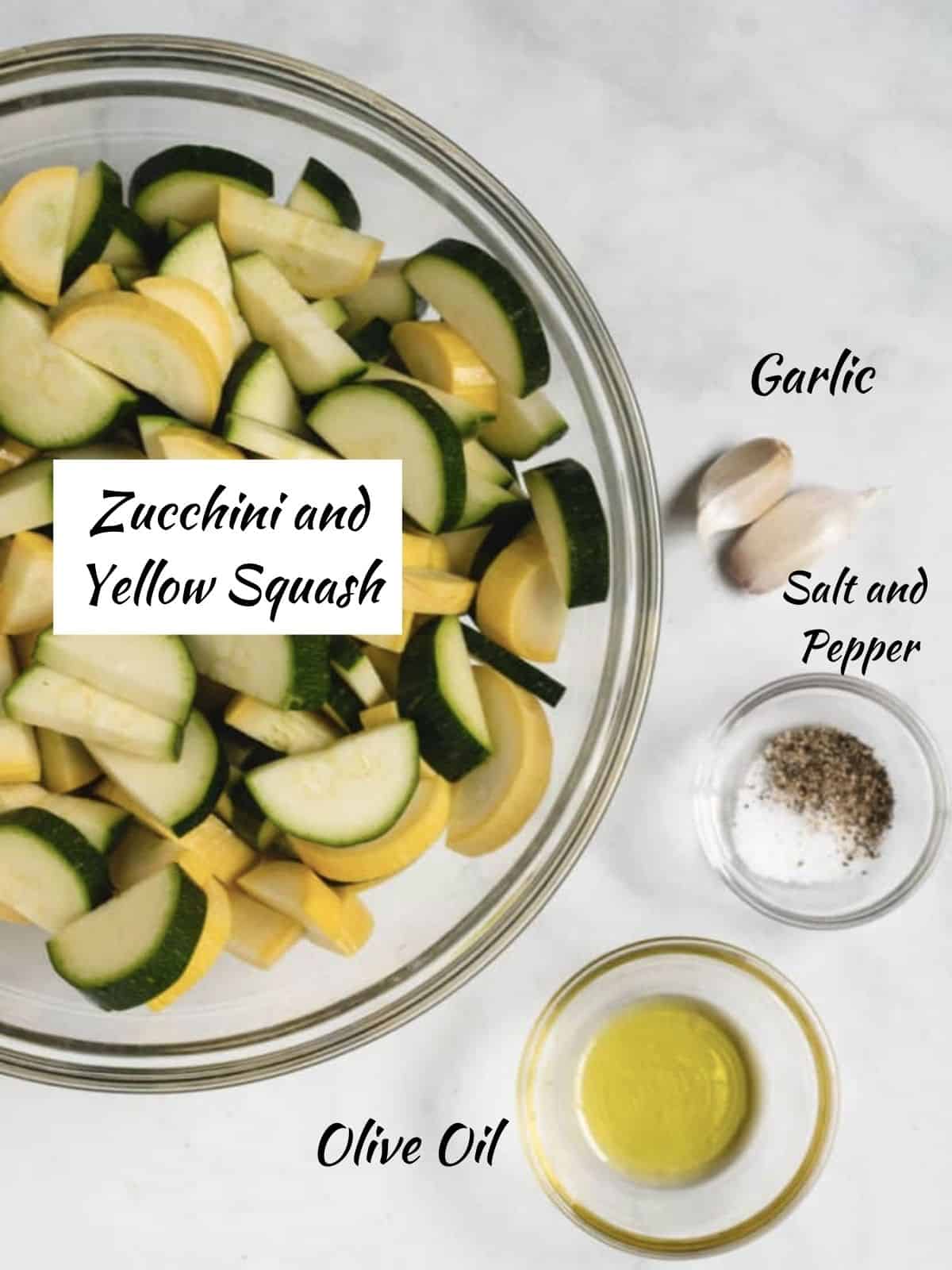 Air Fryer Squash Ingredients: Sliced zucchini and yellow squash, 2 cloves of garlic, salt and pepper, olive oil. 