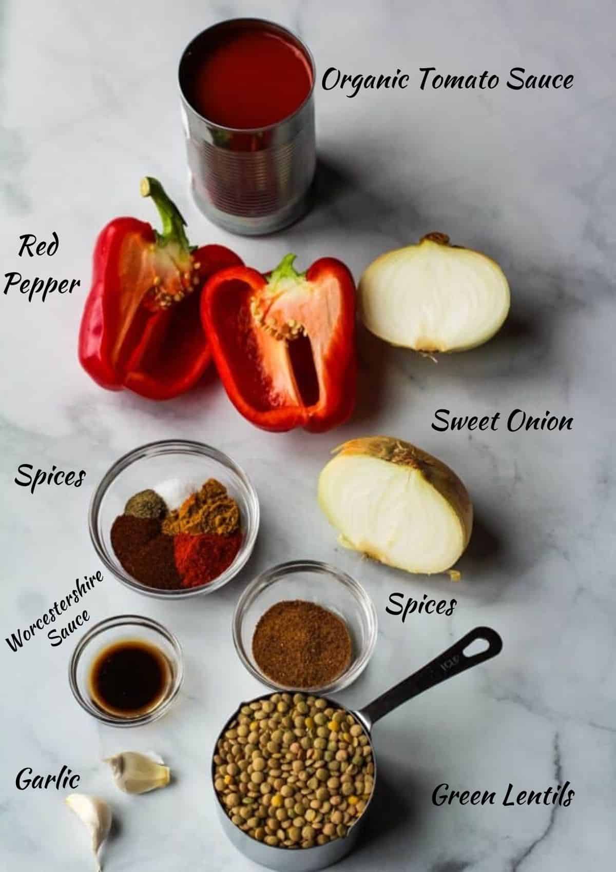 Ingredients needed for vegan sloppy joes, tomato sauce, red pepper, onion, spices, lentils, garlic.