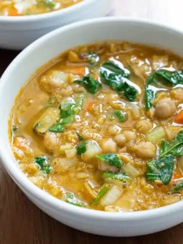 Greek Chickpea soup in white bowl.