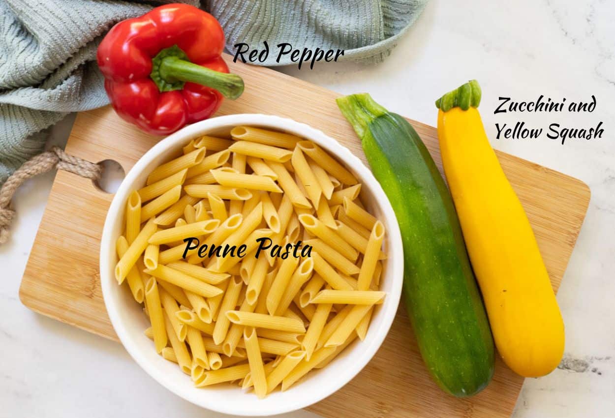 Red Pepper, penne pasta, zucchini, and yellow squash. 