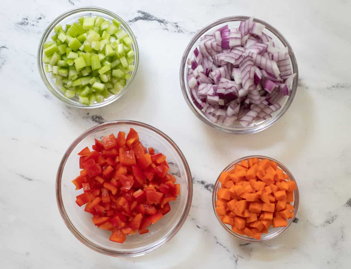Diced celery, diced red onion, diced red pepper, diced carrots.