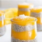 Mango chia pudding in glass containers.