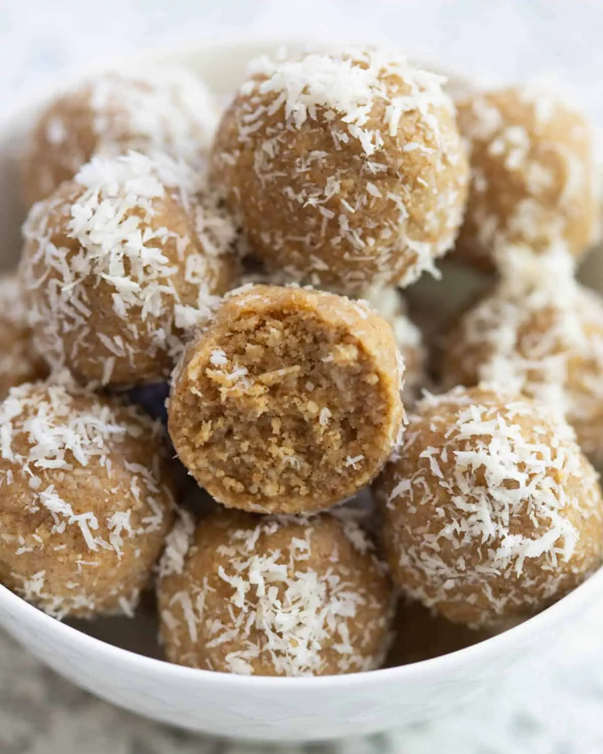 Coconut bliss balls, an easy vegan picnic idea for a snack.
