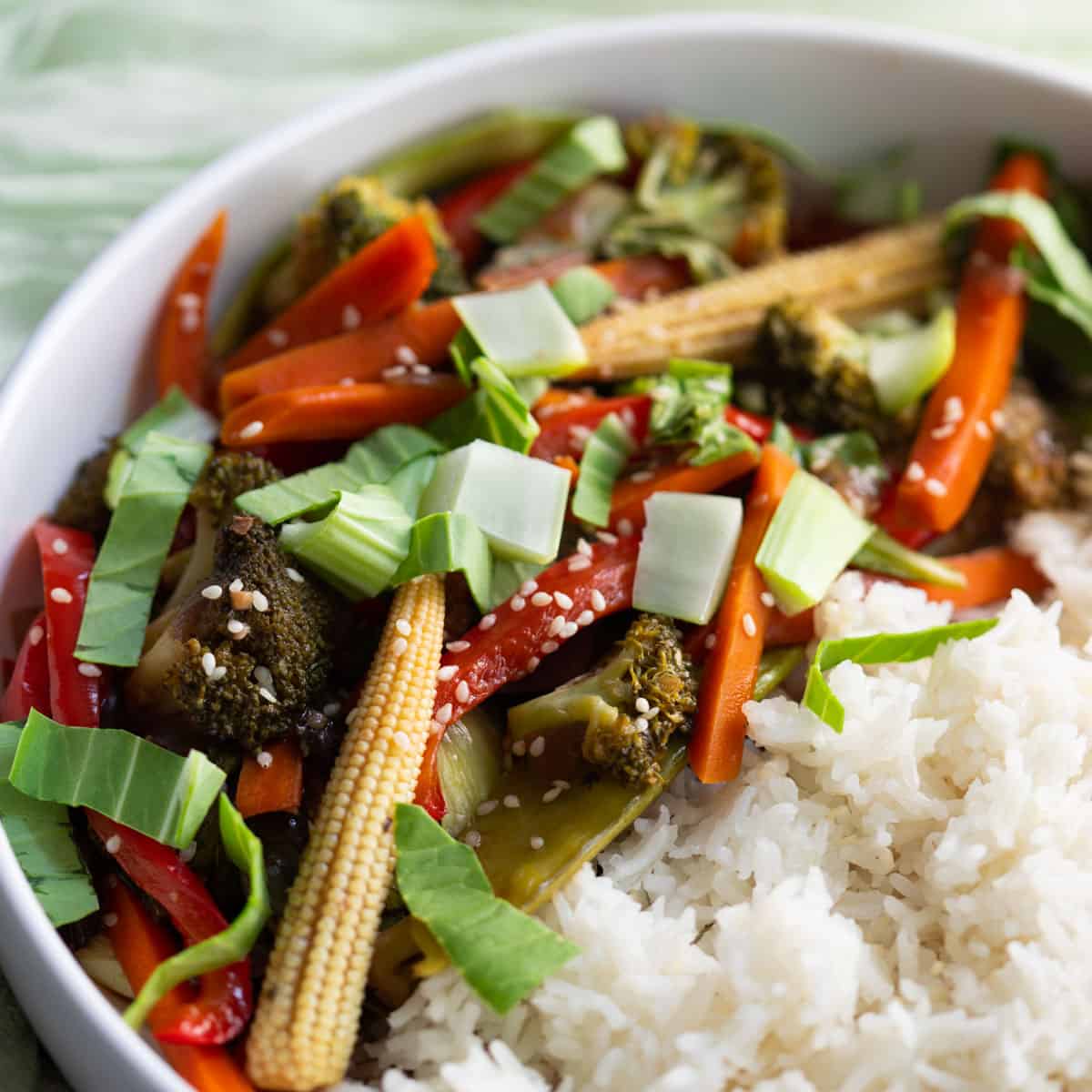 Vegan Stir-Fry served with white rice in a white bowl.
