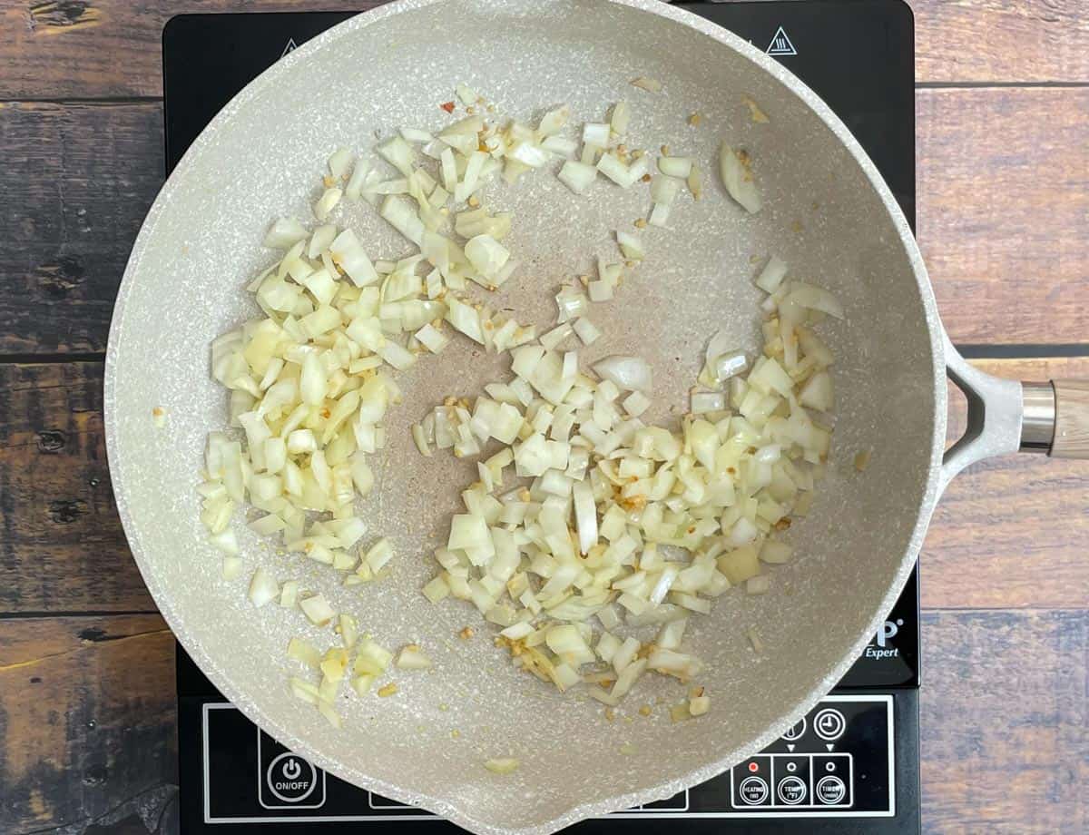 Onions and garlic in saute pan.
