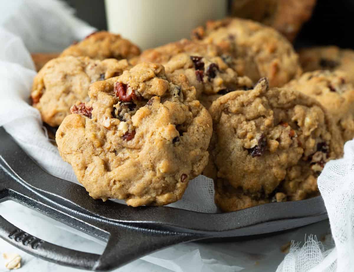 Vegan oatmeal raisin cookies on serving tray.