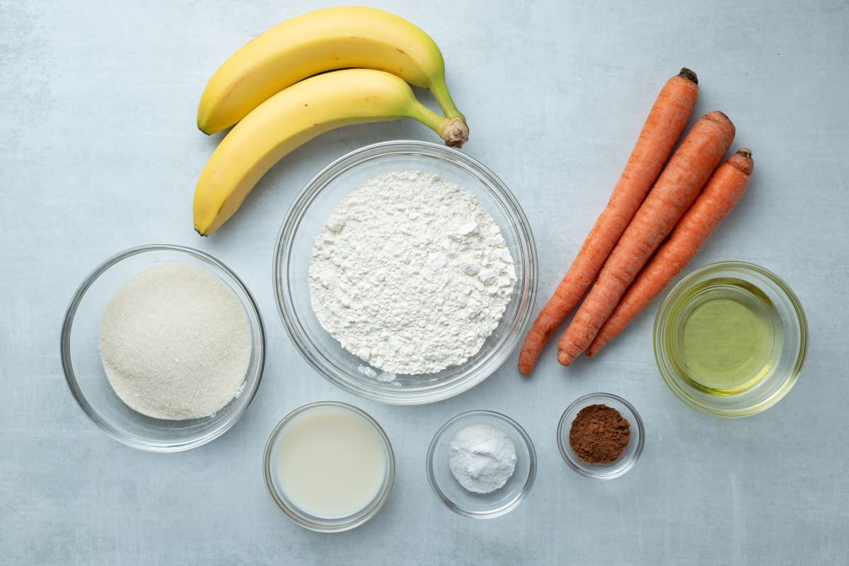 Bananas, carrots, avocado oil, cinnamon, baking powder, baking soda, salt, almond milk, sugar. 