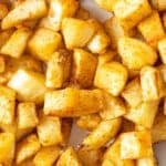 Close up of air fryer home fries.